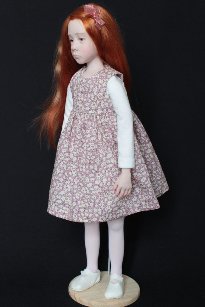 "Petite fille rousse en rose" - Miniature