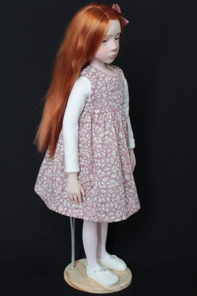 "Petite fille rousse en rose" - Miniature