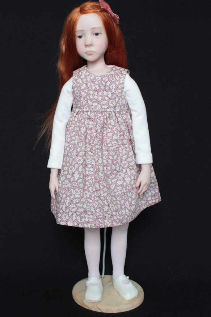 "Petite fille rousse en rose" - Miniature