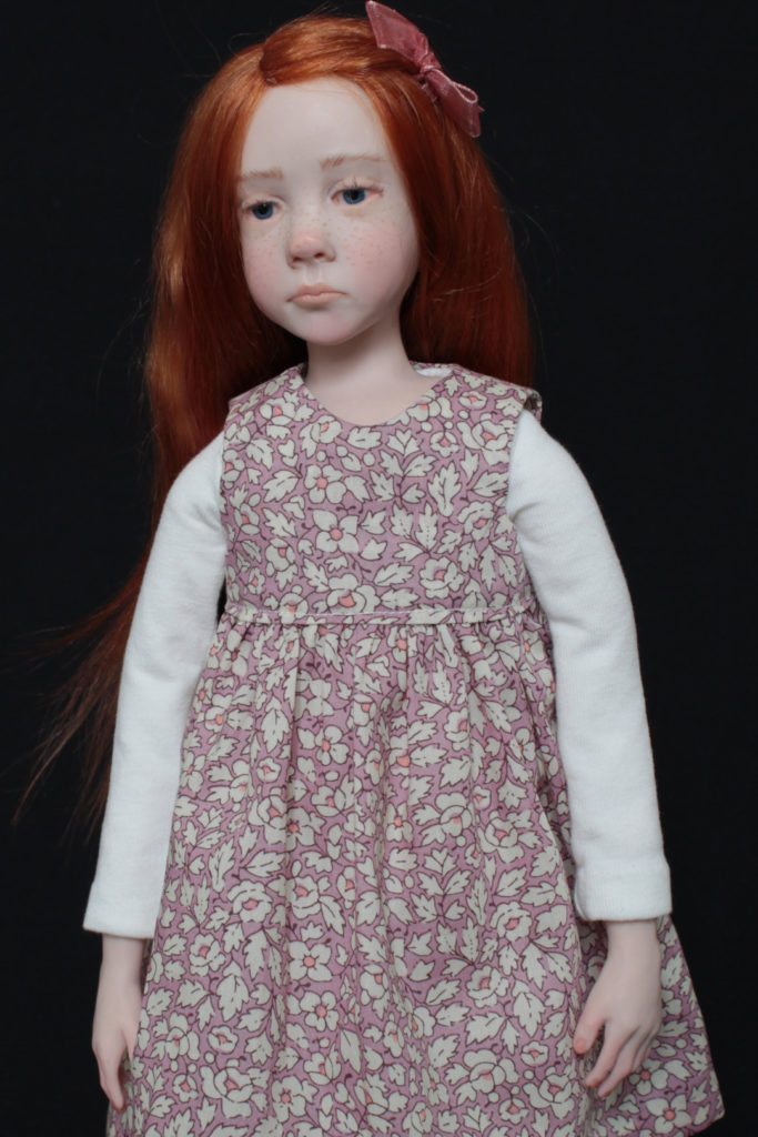 "Petite fille rousse en rose" - Miniature