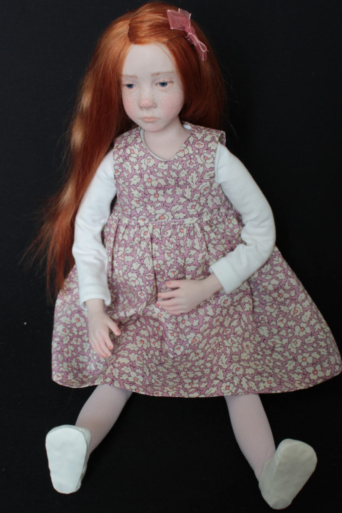 "Petite fille rousse en rose" - Miniature